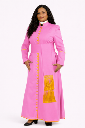 Woman wearing a pink dress with yellow accents on a white background