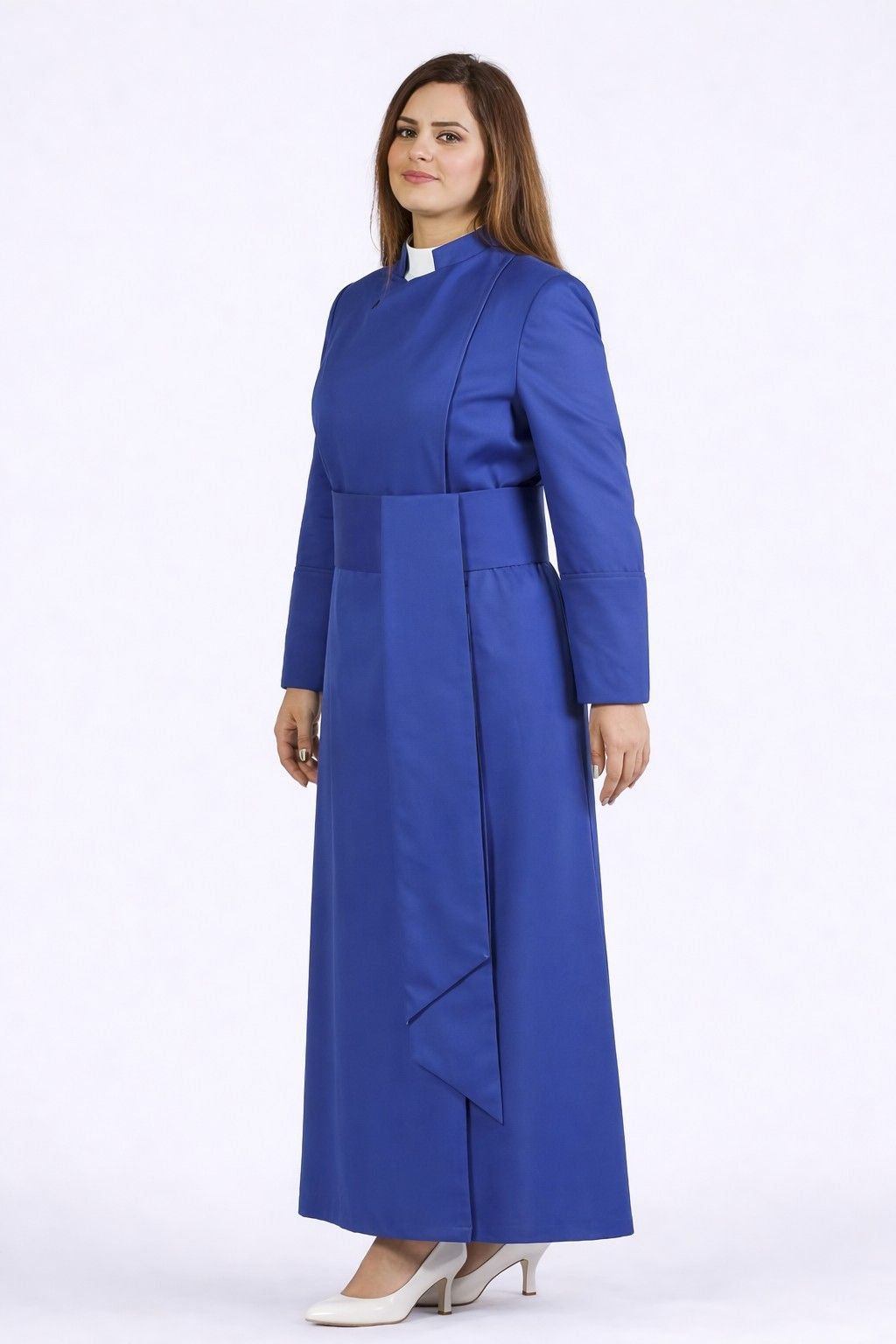 Woman wearing a blue robe with a white background