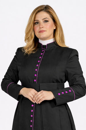 Woman wearing a black robe with purple accents on a white background