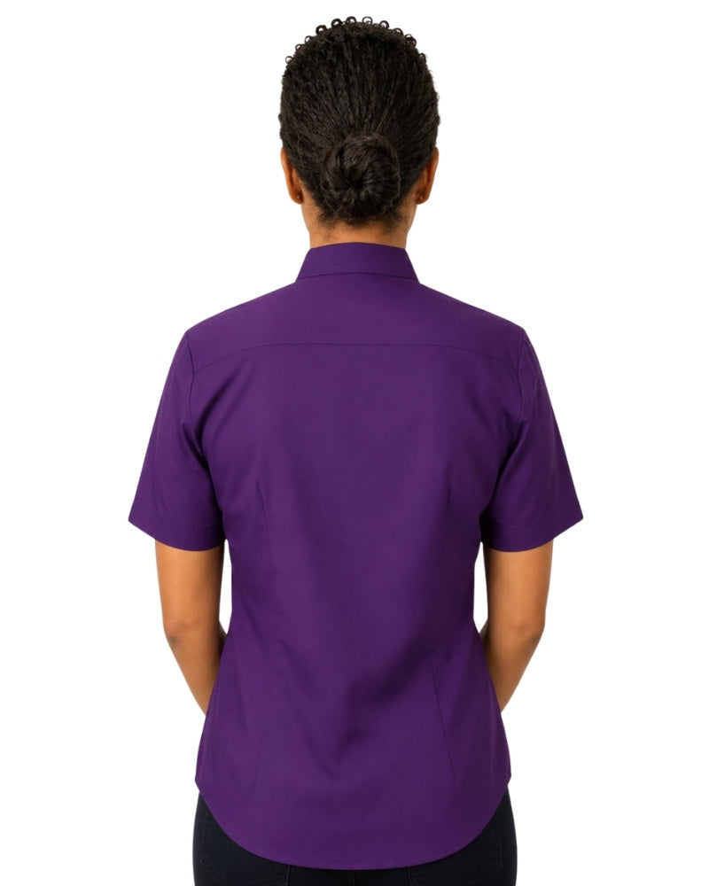 women wearing purple clerical shirt on white background.