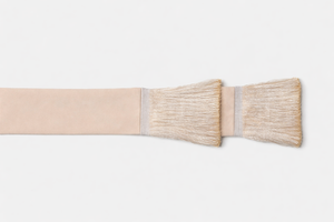 Beige sash on a white background