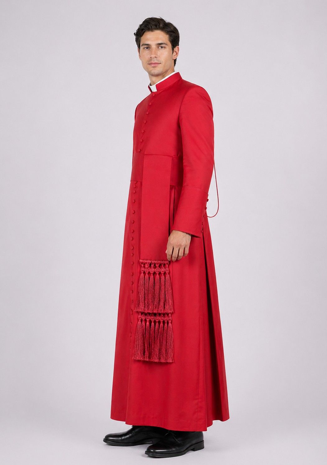 Man wearing a red robe with a white background