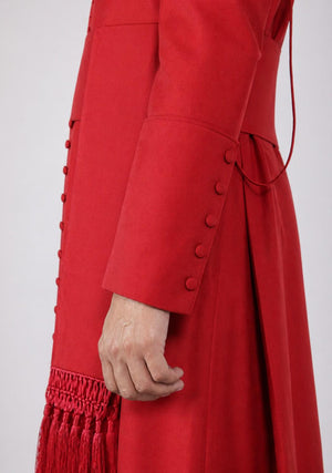 Red cassock with fringes on a white background