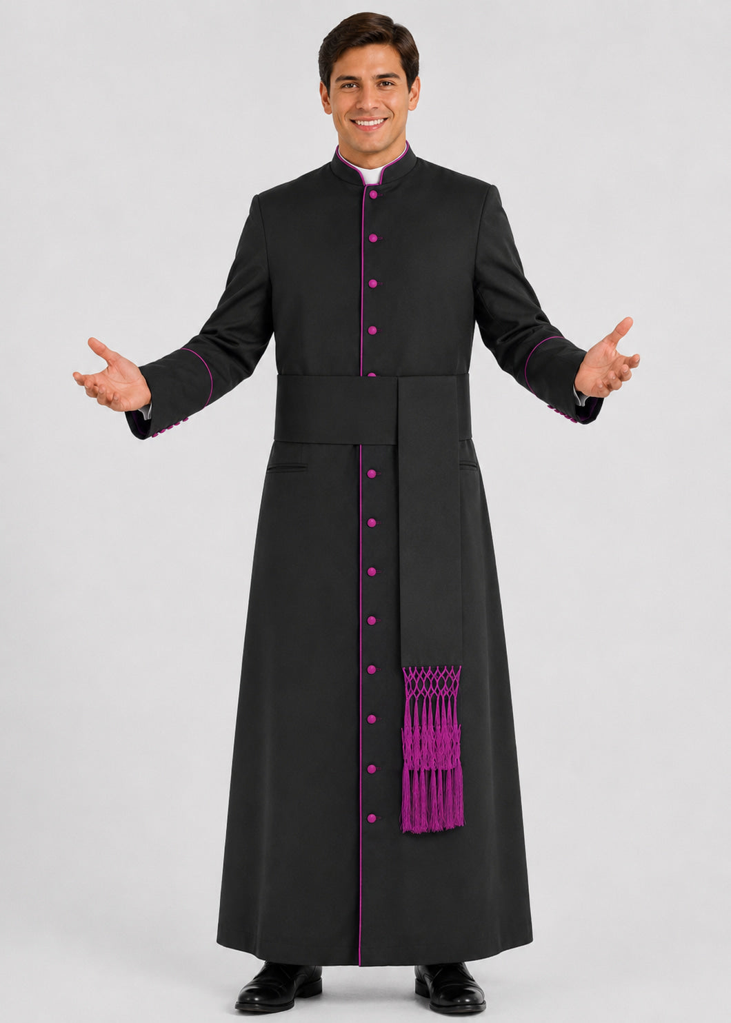 Man wearing a black robe with purple accents on a white background