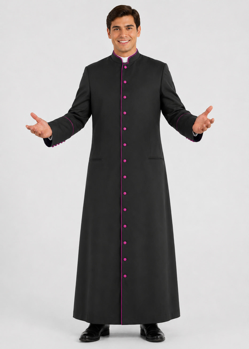 Man wearing a black robe with pink buttons on a white background