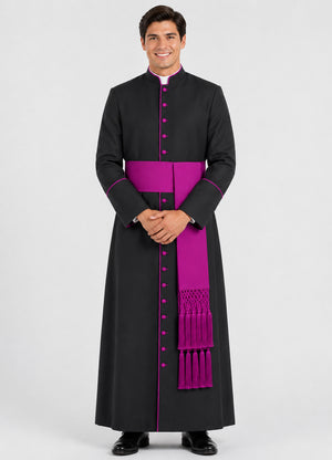 Man wearing a black robe with purple accents on a white background