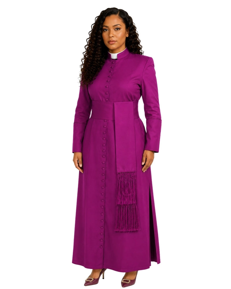 A woman modeling a long magenta-purple clerical cassock with a white collar, standing against a plain white background.