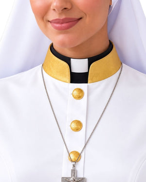 A close-up of a woman wearing a Aria White Clergy Robe With Gold with a gold and black collar, wearing a silver crucifix necklace.
