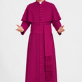 Man wearing a magenta robe on a white background