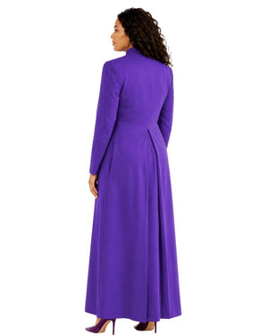 A woman shown from the back wearing a long-sleeved purple cassock with a structured collar and a matching belt at the waist, paired with matching purple heels, against a plain white background.
