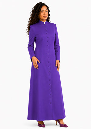 Woman wearing a purple robe with buttons on a white background