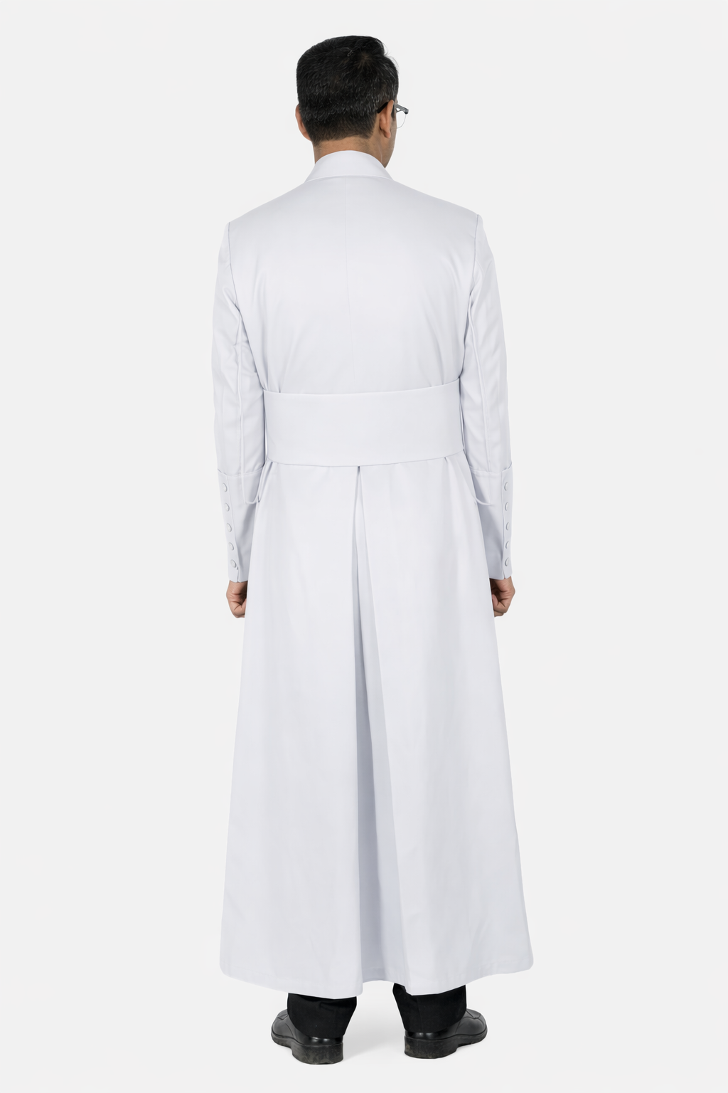 Man wearing a long white robe on a white background