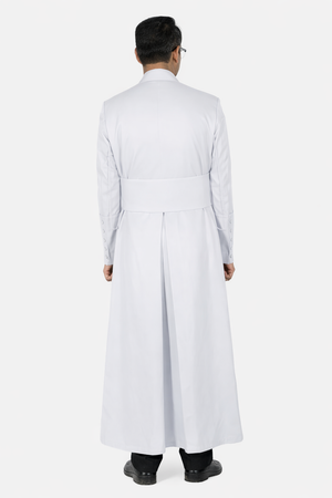 Man wearing a long white robe on a white background