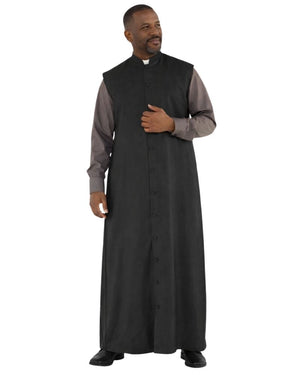 A man modeling a long black clerical robe over a gray long-sleeve shirt and white collar, standing against a plain white background.
