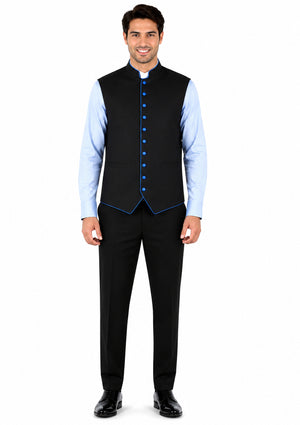 Man wearing a black vest over a light blue shirt with blue trim on a white background