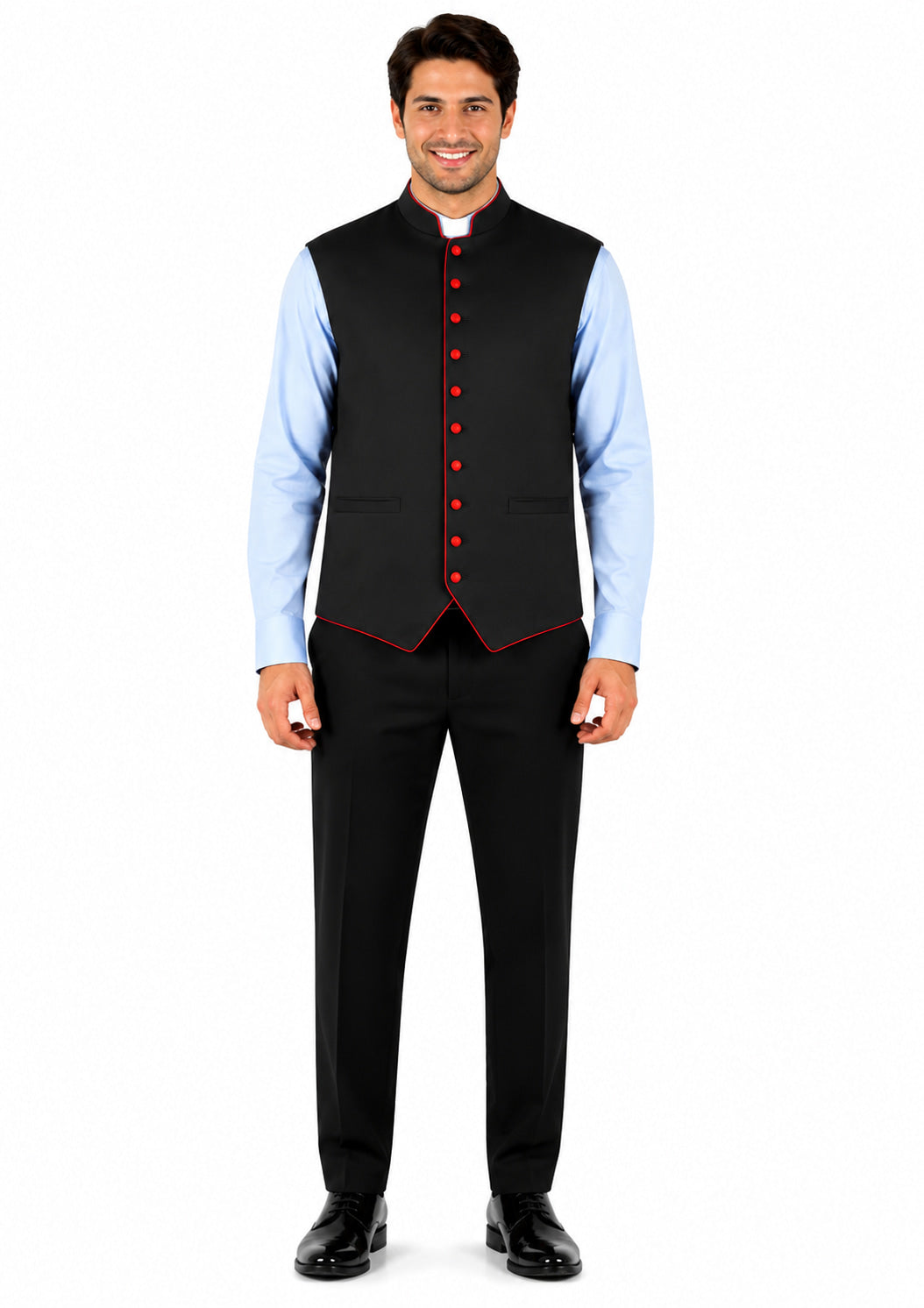 Man wearing a black vest with orange buttons over a light blue shirt on a white background