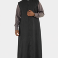 Man wearing a long black robe with a white background