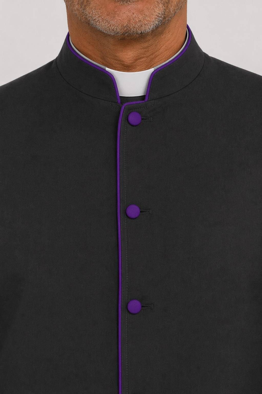 Black shirt with purple buttons on a plain background