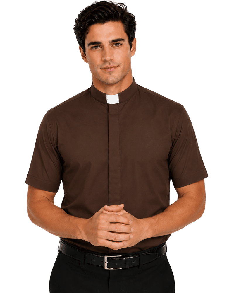 A man wearing a brown short-sleeve priest collar shirt with a white collar tab, paired with black pants and a black belt, against a plain white background.