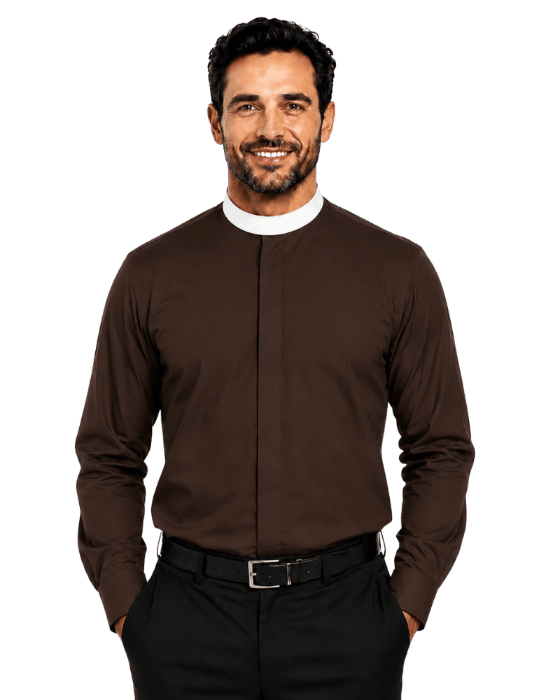 A smiling man wearing a dark brown long-sleeve clerical shirt with a white collar, paired with black trousers and a black belt, against a solid white background.
