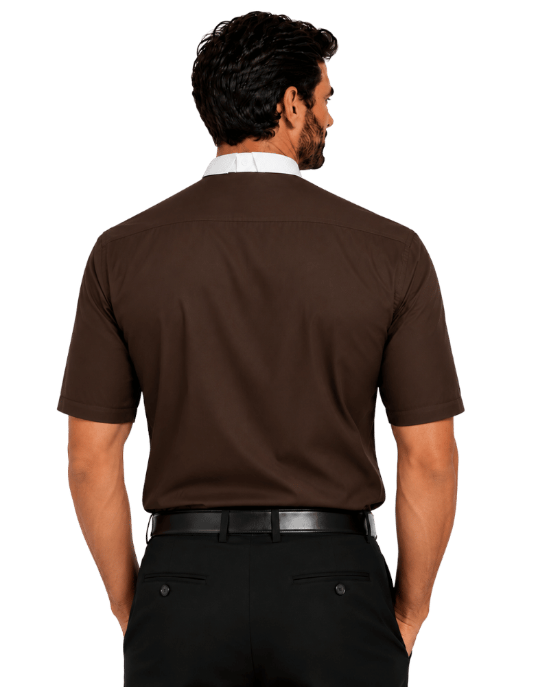 A man shown from the back wearing a dark brown short-sleeve clerical shirt, black trousers, and a white dress shirt collar, against a plain white background.