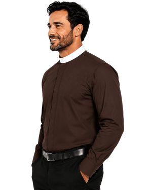 A man wearing a dark brown long-sleeve clerical shirt with a high white mock neck collar, paired with black trousers and a black belt, shown in a side profile against a white background.