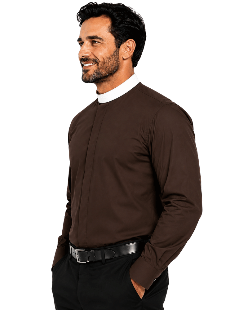 A man wearing a dark brown long-sleeve clerical shirt with a high white mock neck collar, paired with black trousers and a black belt, shown in a side profile against a white background.