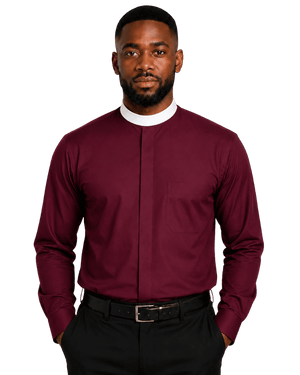 A man wearing a burgundy long-sleeve clerical shirt with a stand collar, paired with black trousers and a black belt, photographed against a solid white background.