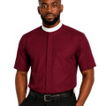 A man wearing a burgundy short-sleeve clerical shirt with a white collar, paired with black trousers and a black belt, photographed against a solid white background.