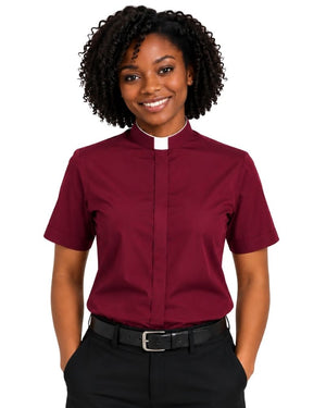 A woman wearing a burgundy short-sleeve clerical shirt with a white collar, paired with black trousers and a black belt, shown against a plain white background.