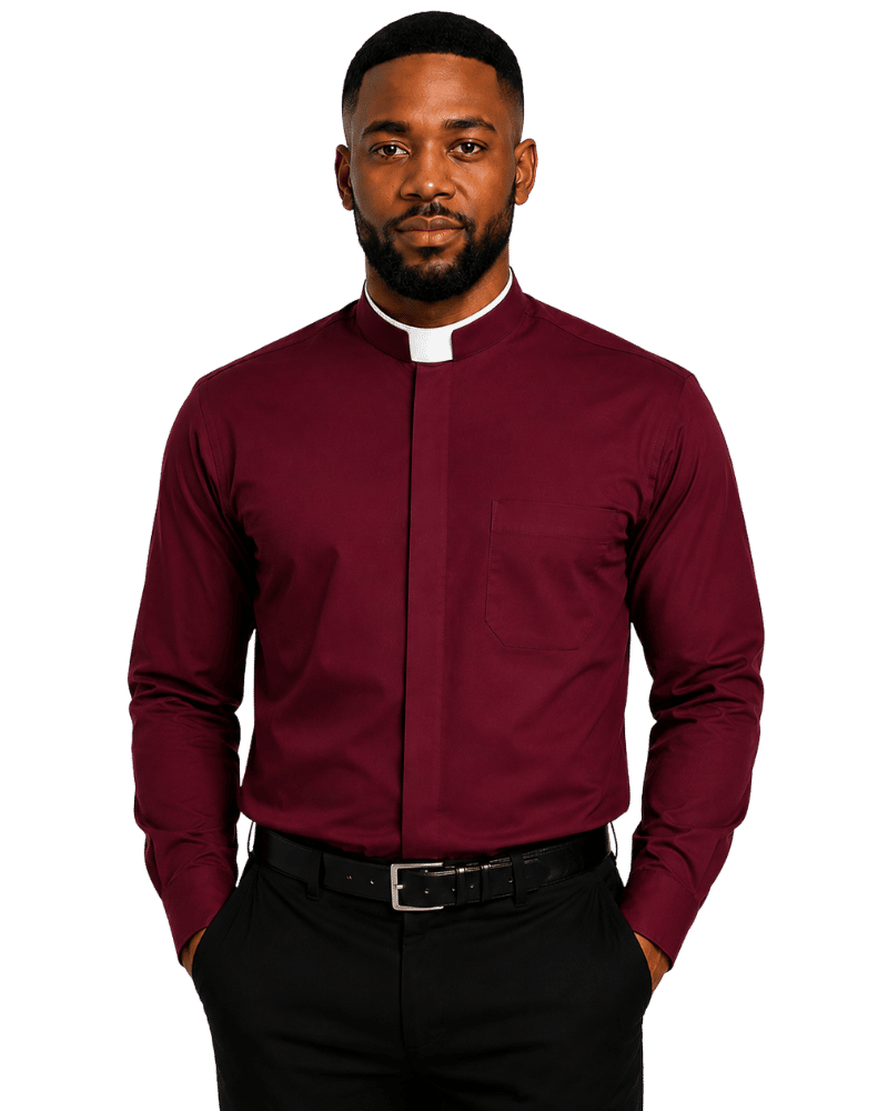 A man wearing a burgundy long-sleeve clerical shirt with a white collar, black trousers, and a black belt, photographed against a plain white background.