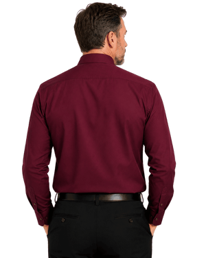 A man viewed from the back wearing a long-sleeve clerical shirt in deep burgundy and black trousers, set against a plain white background.