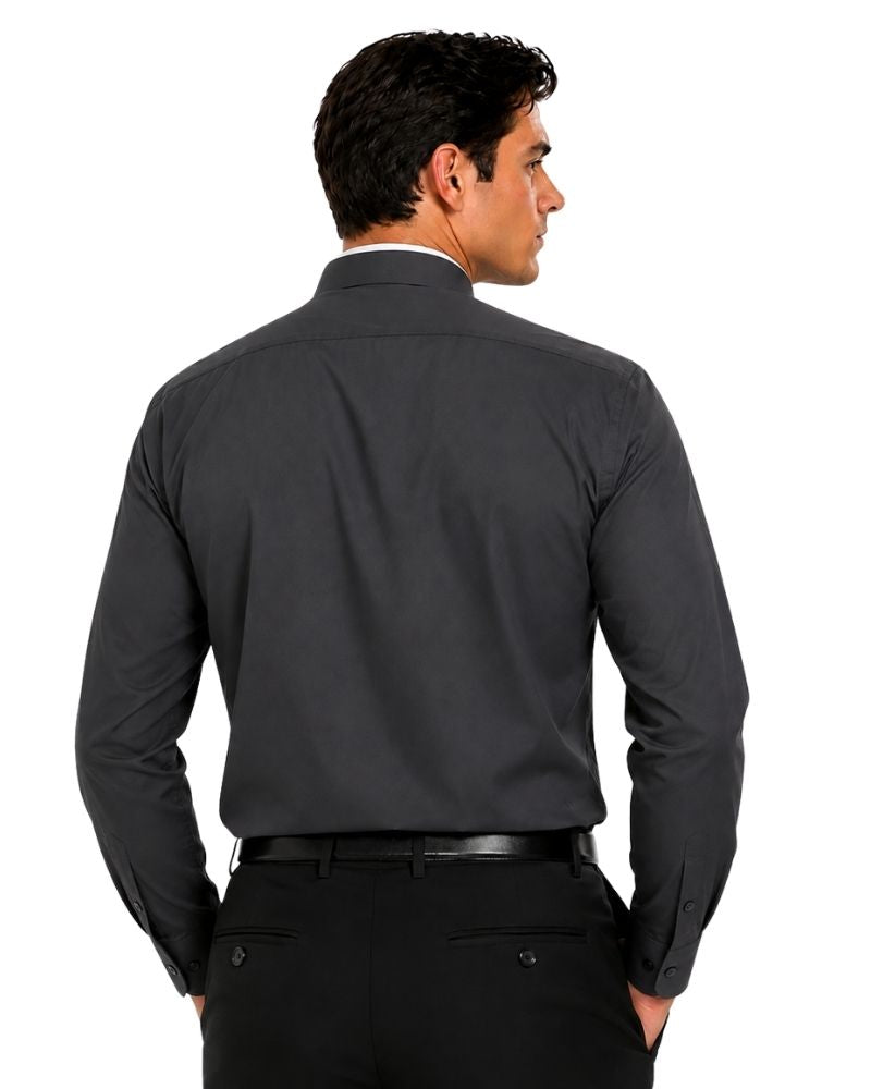 A man shown from the back wearing a dark charcoal gray long-sleeve clerical shirt with black trousers, photographed against a solid white background.