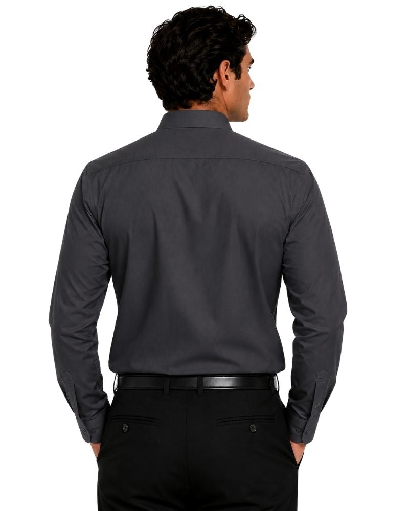 A man viewed from the back wearing a dark charcoal gray long-sleeve clerical shirt, black trousers, and a black belt against a plain white background.