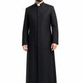 Man wearing a black priest's robe on a white background