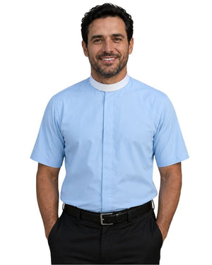 A smiling man wearing a light blue short-sleeve clerical shirt with a white collar, paired with black trousers and a black belt, against a plain white background.