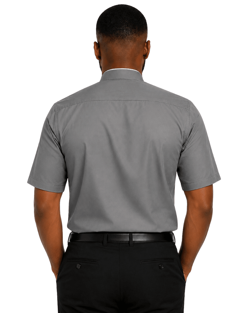 A man viewed from the back wearing a short-sleeve gray clerical shirt, black trousers, and a black belt against a plain white background.