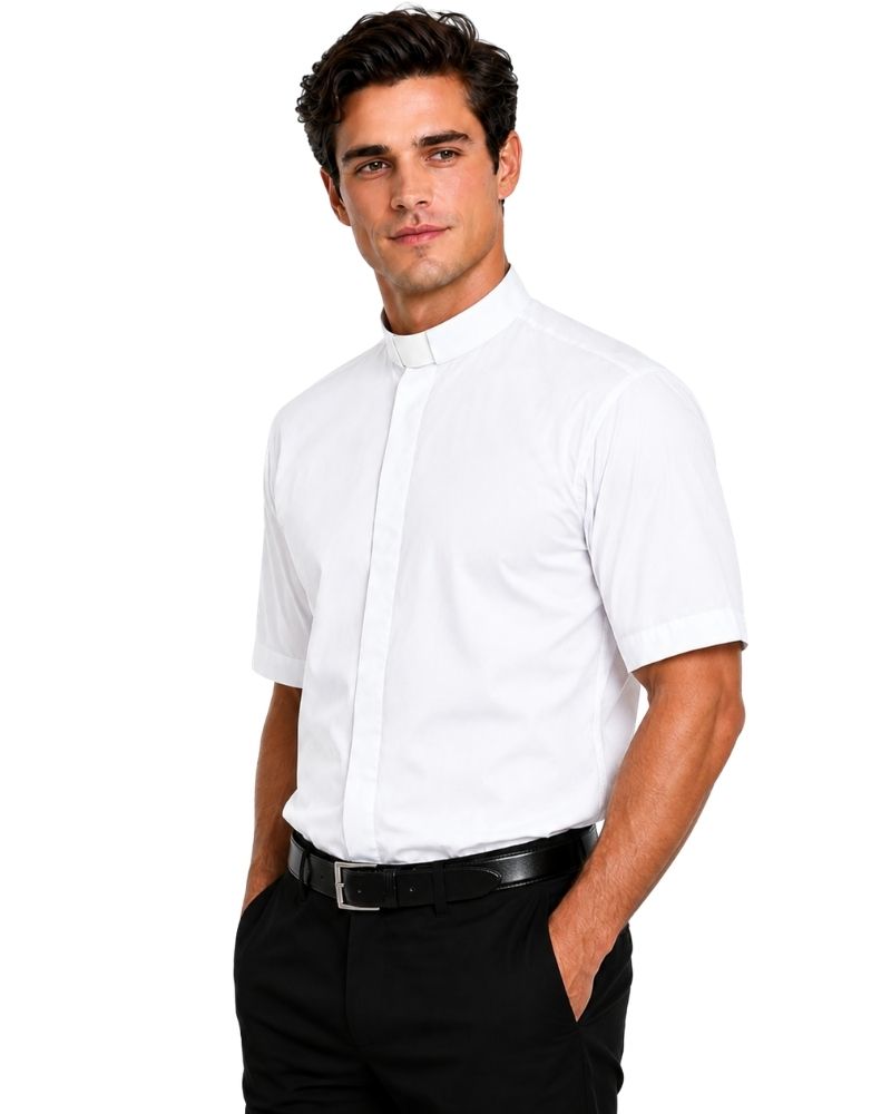A man wearing a white short-sleeve clerical shirt with a high mock neck collar, paired with black trousers and a black belt, photographed against a solid white background.