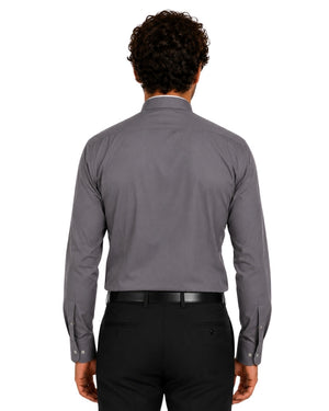 Man wearing a gray clerical shirt with a white collar on a white background