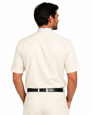 A man shown from the back wearing a short-sleeve cream-colored clerical shirt, cream trousers, and a black belt, against a plain white background.