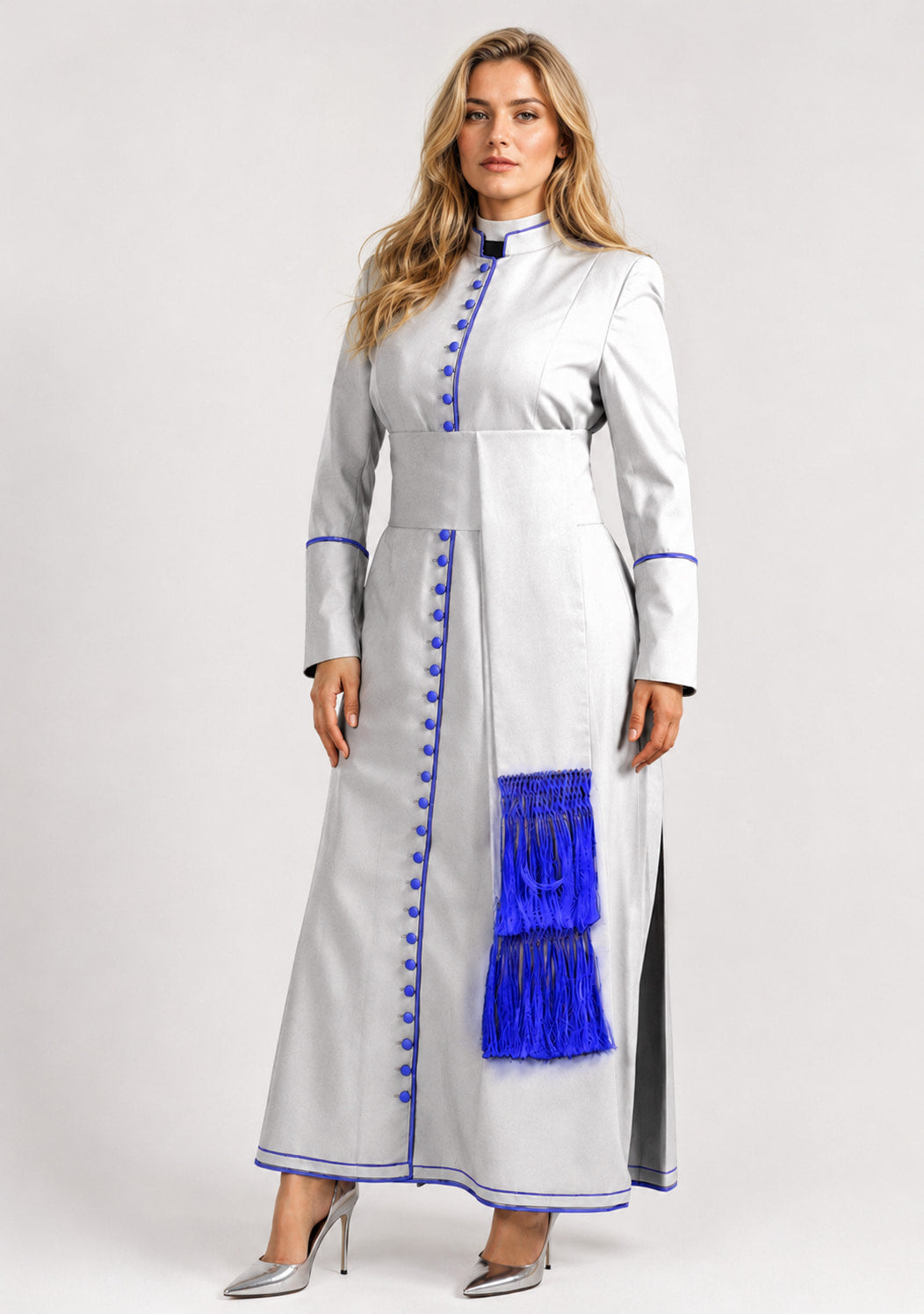 Woman wearing a long white robe with blue accents on a white background