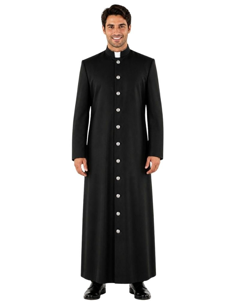 A man modeling a long black clerical cassock with a high collar, white collar insert, and a front button closure, photographed against a plain white background.