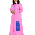 A woman modeling a long pink cassock with blue trim, blue buttons, and a blue fringe detail on the front, set against a plain white background.