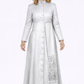 Woman wearing a long silver dress with a white background