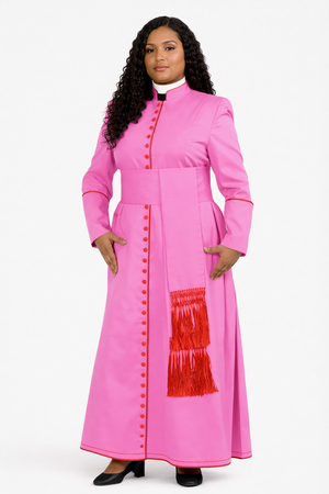 Woman wearing a pink dress with red accents on a white background