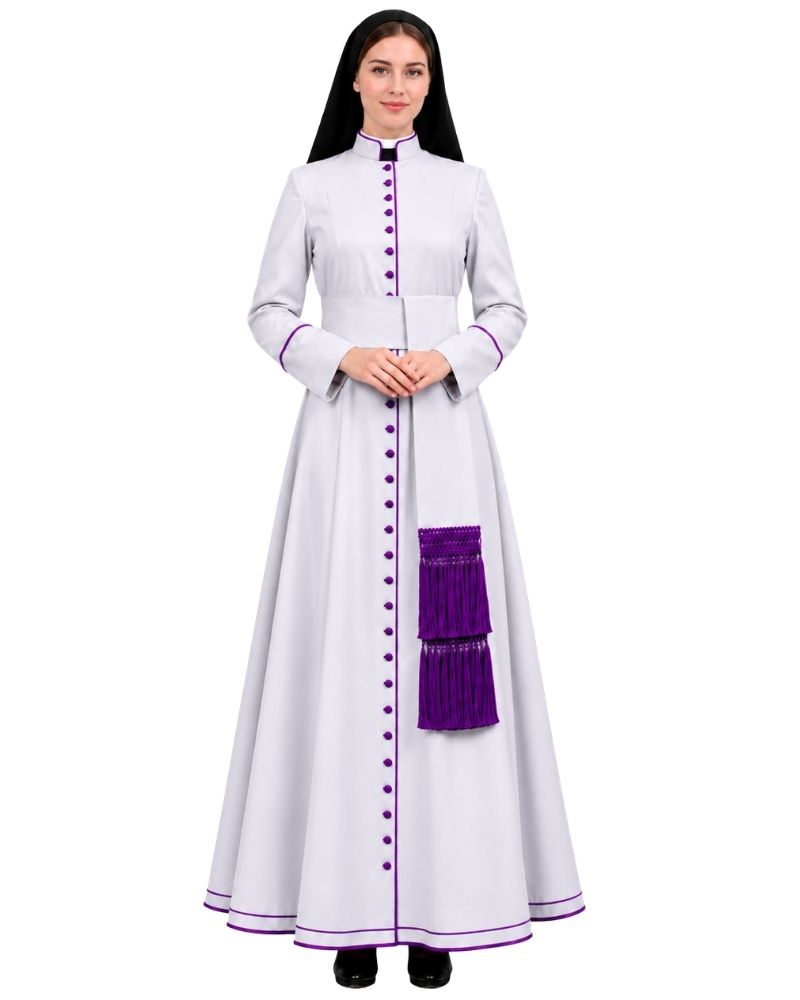 A woman modeling a White Clergy Cassock With Purple Trim, purple buttons, and a purple pleated front detail, shown against a plain white background.