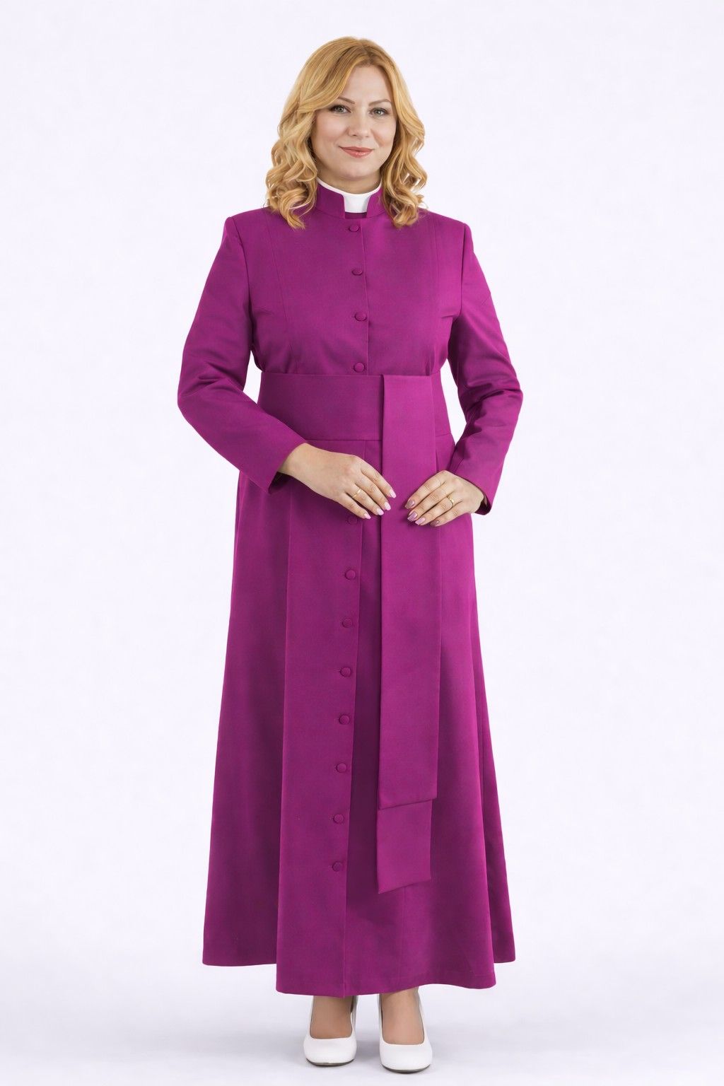 Woman wearing a long purple robe on a white background
