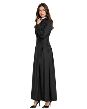 A woman modeling a long black cassock or robe with long sleeves, a high collar, and a pleated skirt, paired with black high heels, against a plain white background.