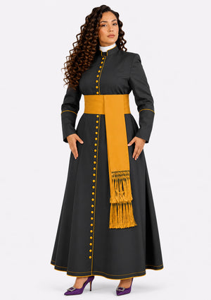 Woman wearing a black robe with yellow accents and a matching scarf on a white background