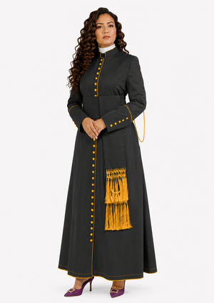 Woman wearing a black robe with yellow accents on a white background